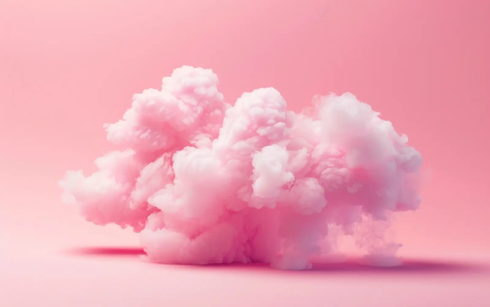 a fluffy floating pink cloud